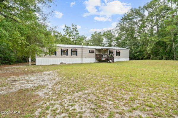 9507 S BURNT MILL CREEK RD, SOUTHPORT, FL 32409 - Image 1