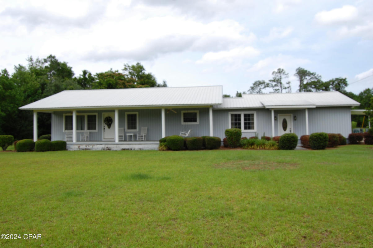 7130 GREEN RD, SNEADS, FL 32460, photo 1 of 35
