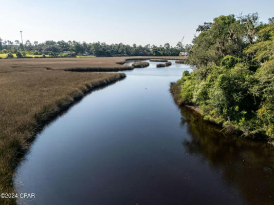 7514 RAILROAD AVE, SOUTHPORT, FL 32409 - Image 1